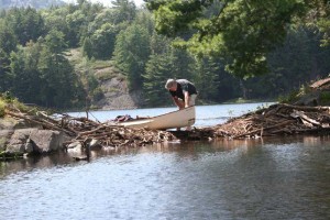 Canoe and man on the lift-over.