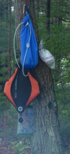 Water filter hanging in a tree