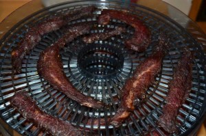 Beef Jerky on dehydrator trays.