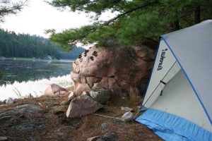 Tent, pick rock on shore