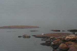 rocks, shoreline, mist.