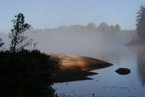 rock shore, mist lifting