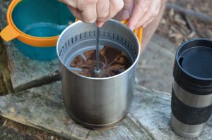 french press and coffee