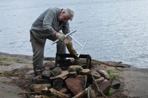 man sawing wood