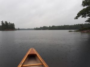 Rain on the water from a canoe