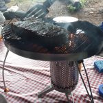 Steak cooking on the grill