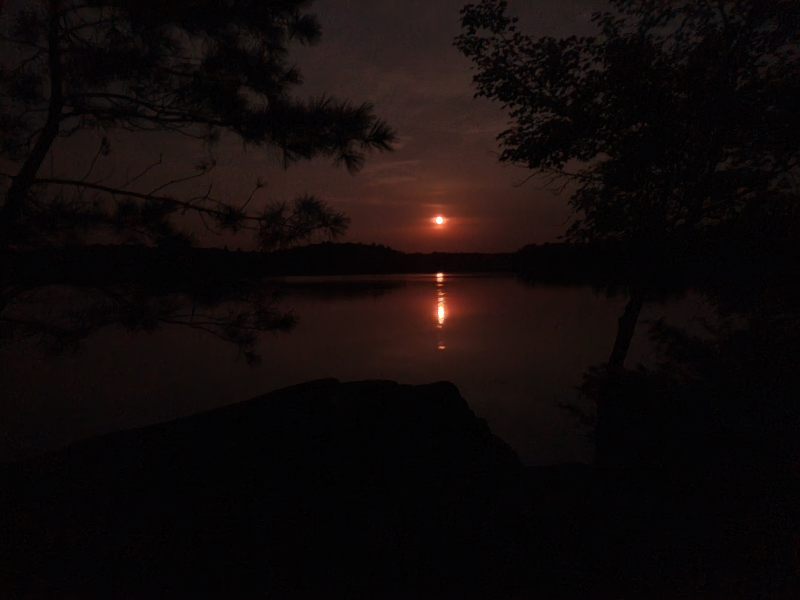 Orange moon over the lake