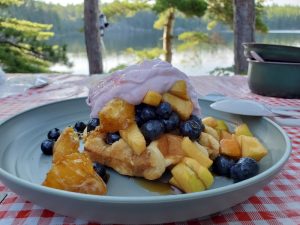 Fruit salad on a green plate