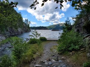 Lake , dock and rocky trail